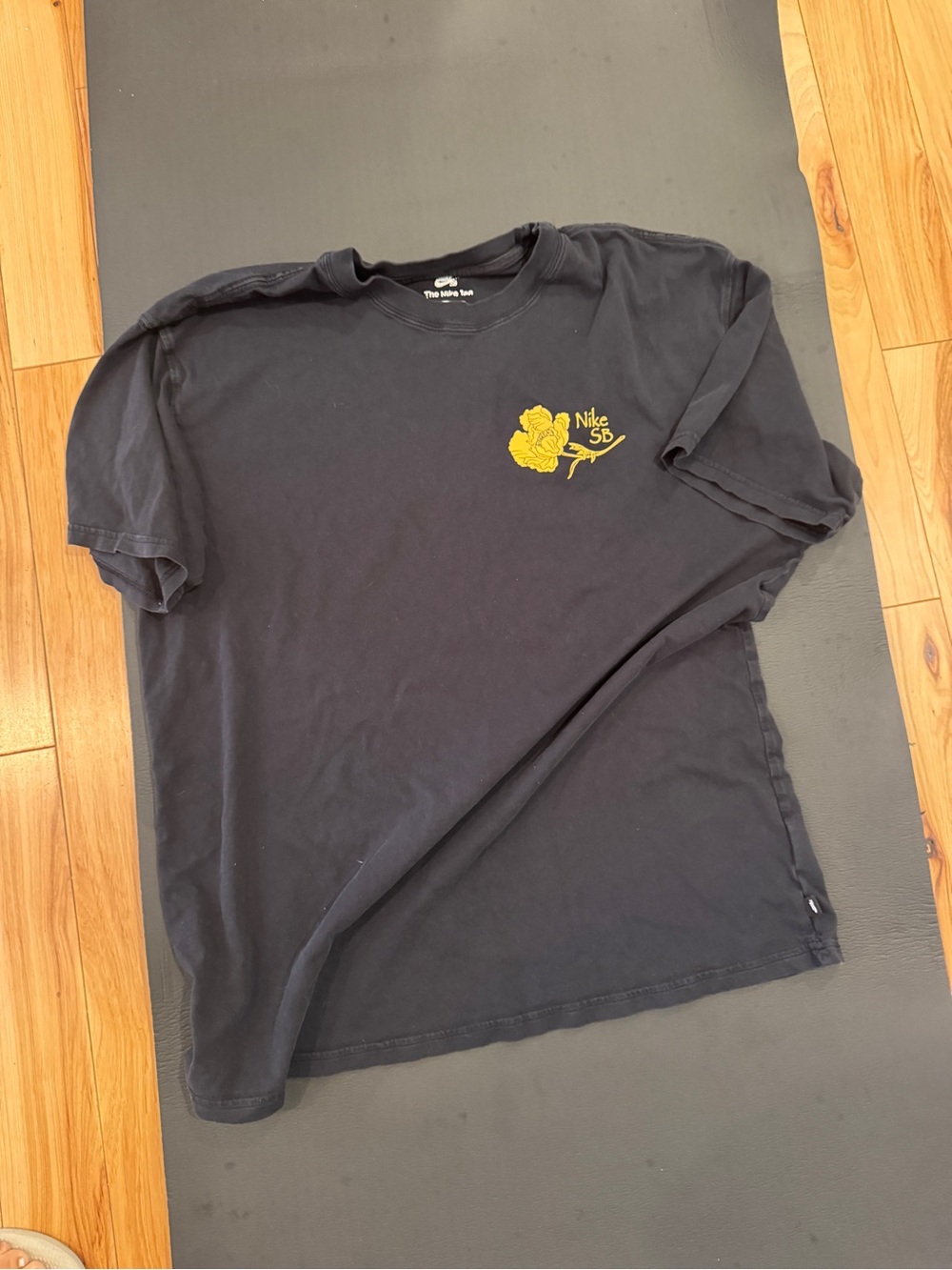 Nike Short-Sleeve Black Tee with Yellow Rose SB Logo